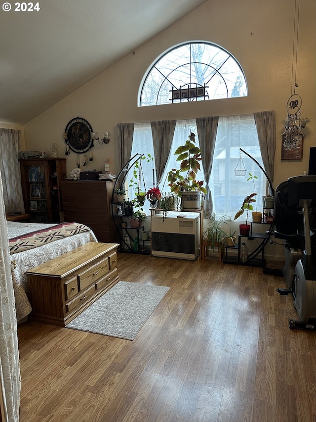 136350 Main St, Crescent, OR 97733 - bedroom featuring wood finished floors and high vaulted ceiling