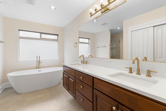 bathroom featuring vanity, separate shower and tub, and tile patterned flooring