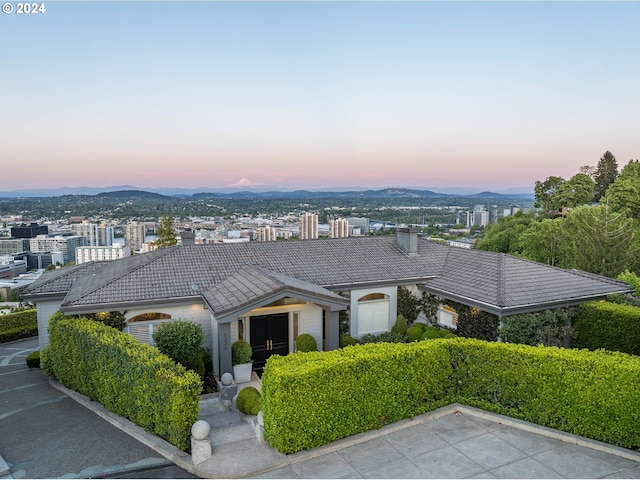 aerial view at dusk with a mountain view