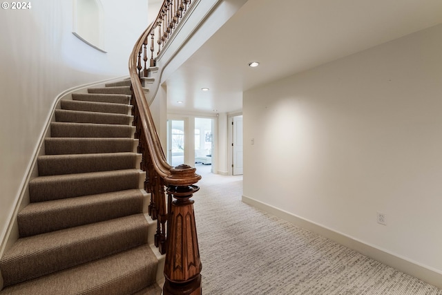 stairway with carpet flooring