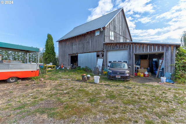 view of outbuilding with a garage