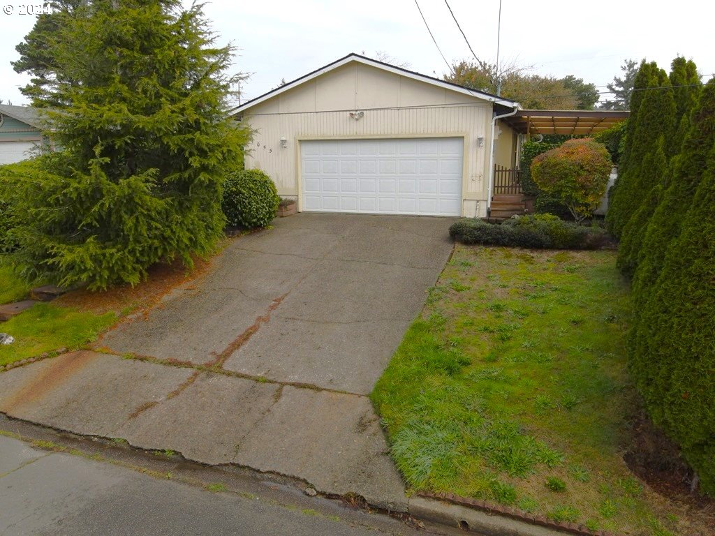 garage with a yard