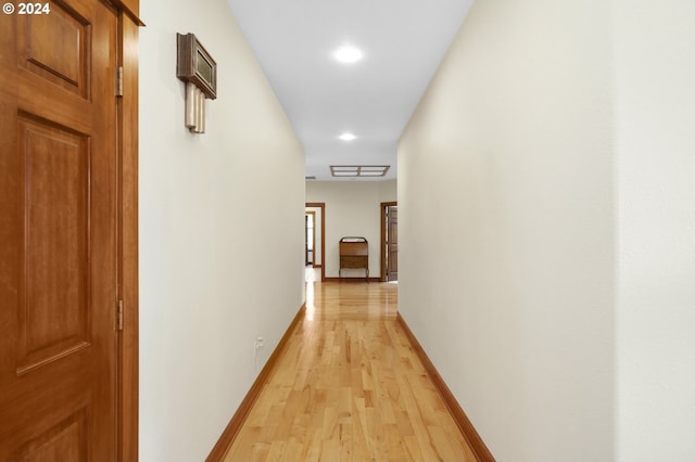 corridor featuring light hardwood / wood-style flooring