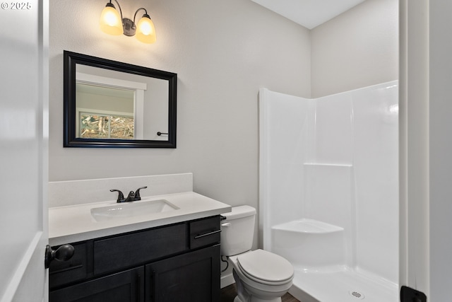 130 E H St, Vernonia, OR 97064 - bathroom with a shower, vanity, and toilet