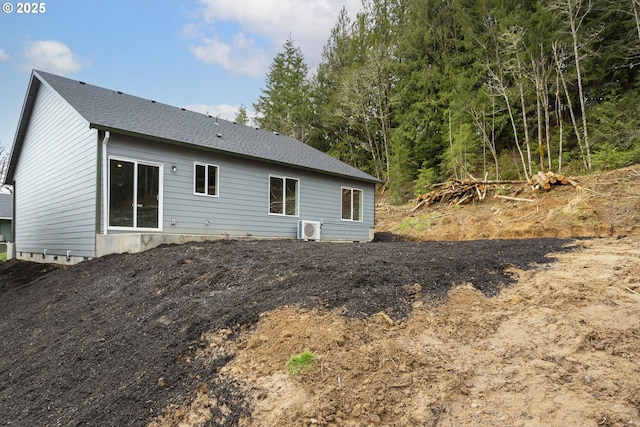 130 E H St, Vernonia, OR 97064 - rear view of house with a shingled roof and ac unit