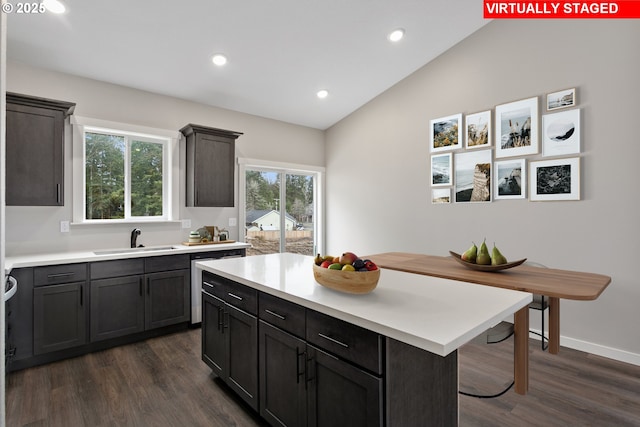 130 E H St, Vernonia, OR 97064 - kitchen featuring dishwasher, a sink, light countertops, dark wood finished floors, and vaulted ceiling