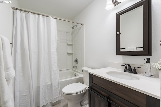 full bathroom with vanity, toilet, and shower / bath combo with shower curtain