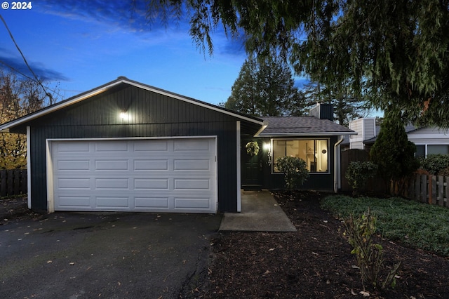 ranch-style home with a garage