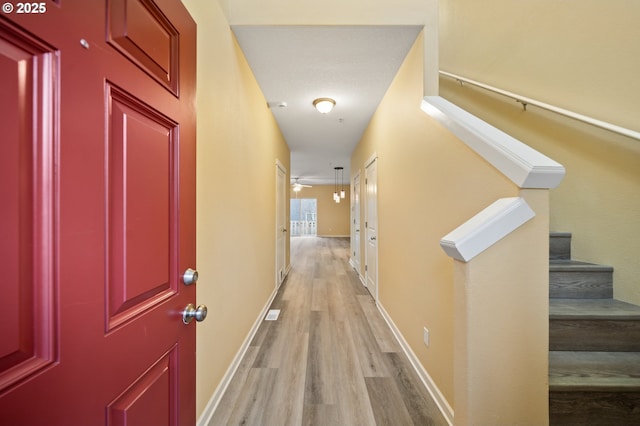 hall featuring light hardwood / wood-style floors