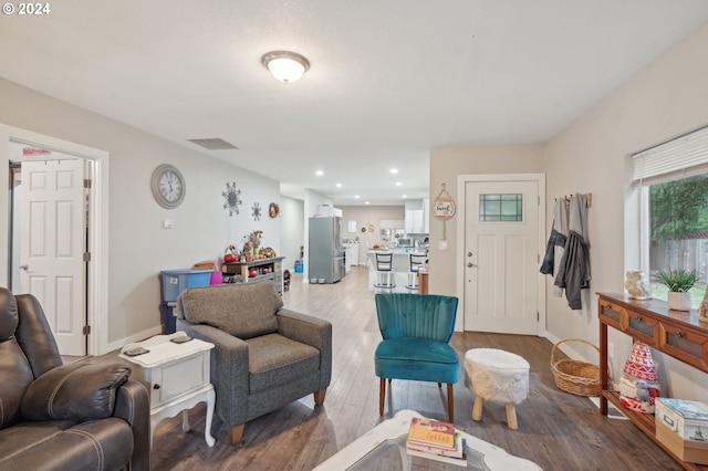 living room with hardwood / wood-style flooring