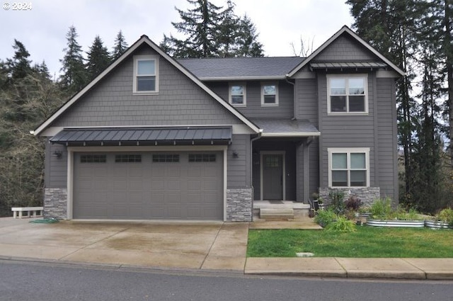 craftsman-style home with a garage