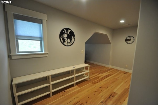 bonus room featuring hardwood / wood-style floors