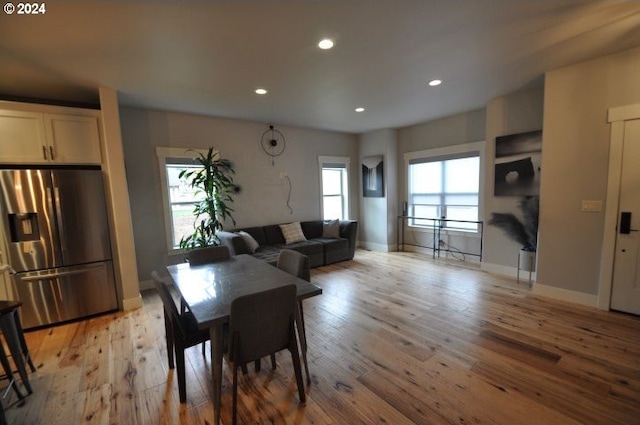 dining space featuring light hardwood / wood-style flooring