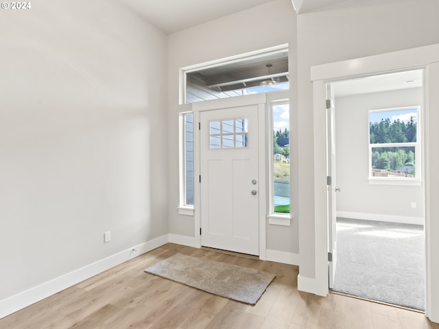 entrance foyer with light wood-type flooring