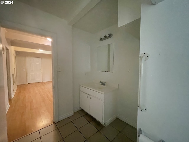 bathroom featuring hardwood / wood-style flooring and sink