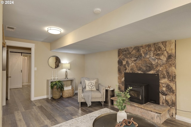 sitting room featuring dark hardwood / wood-style flooring