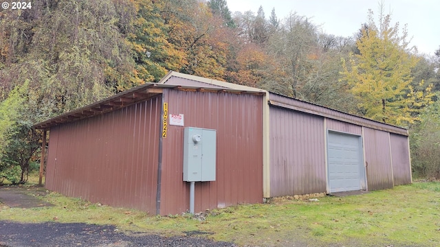 view of outbuilding with a garage