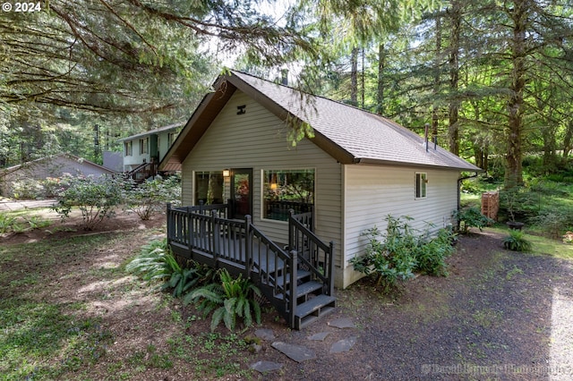 exterior space with a wooden deck