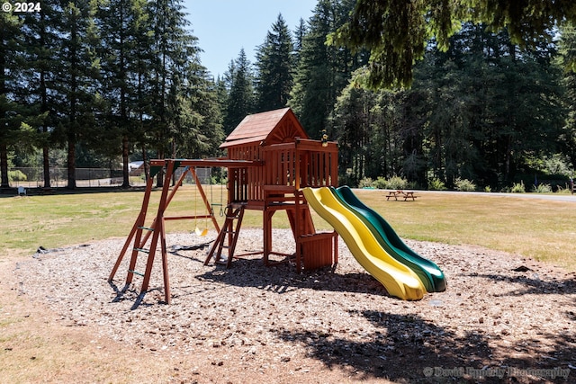 view of jungle gym with a yard