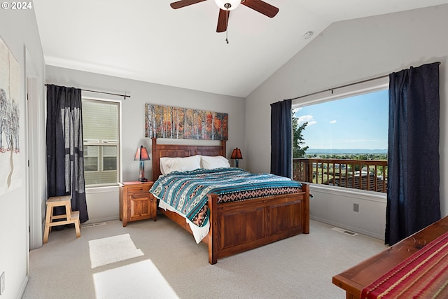 bedroom with light carpet, ceiling fan, vaulted ceiling, and visible vents