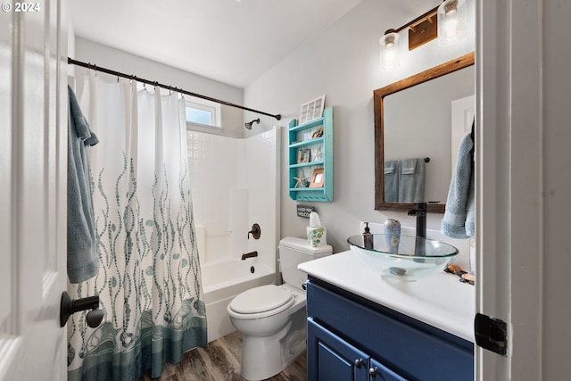 full bath featuring shower / tub combo with curtain, vanity, toilet, and wood finished floors