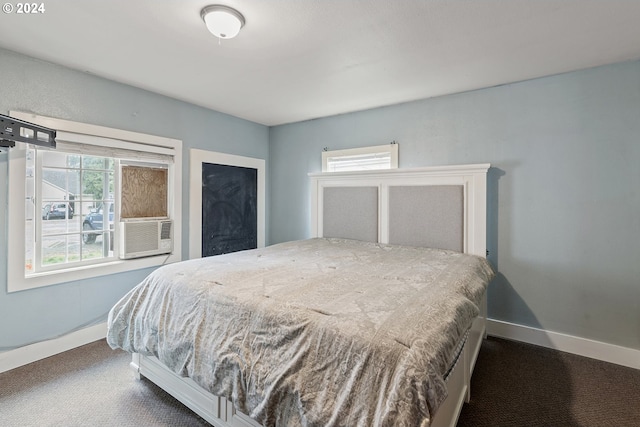 bedroom featuring carpet floors and cooling unit