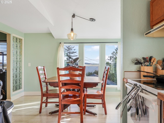 740 Florence Ave, Astoria, OR 97103 - dining room with light wood-type flooring and baseboards