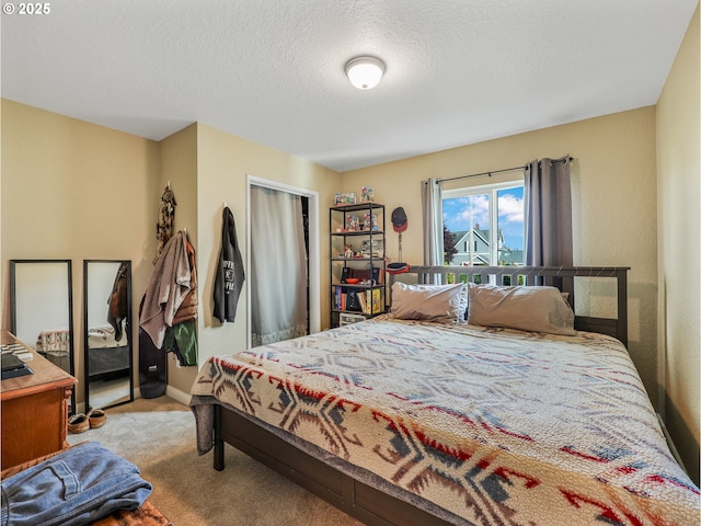 740 Florence Ave, Astoria, OR 97103 - bedroom with carpet floors and a textured ceiling