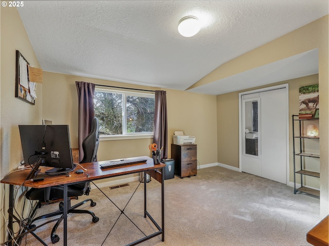 740 Florence Ave, Astoria, OR 97103 - office area with lofted ceiling, a textured ceiling, light colored carpet, and baseboards