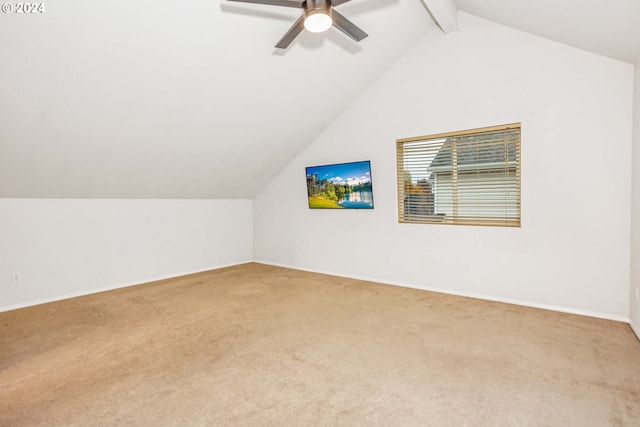 bonus room with lofted ceiling with beams, carpet floors, and ceiling fan