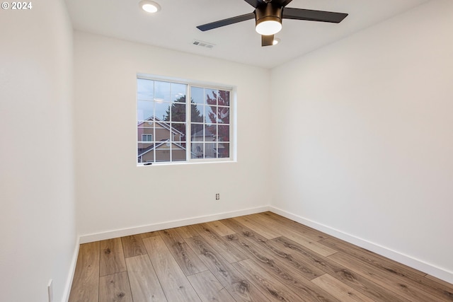 1018 NE Mariners Loop, Portland, OR 97211 - unfurnished room featuring wood finished floors, baseboards, a ceiling fan, and recessed lighting