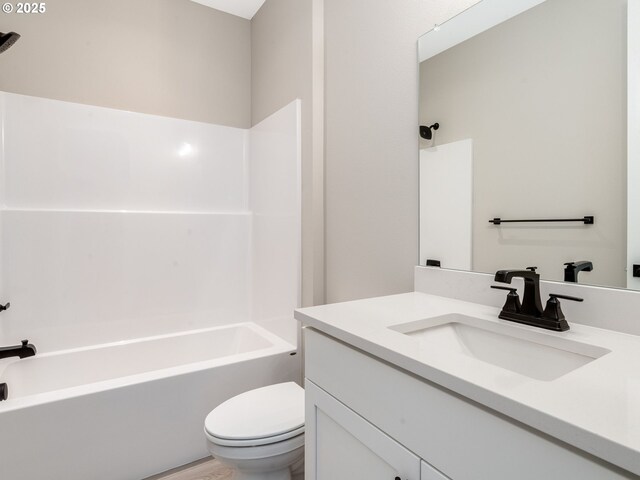 bathroom featuring vanity, a shower, and wood-type flooring