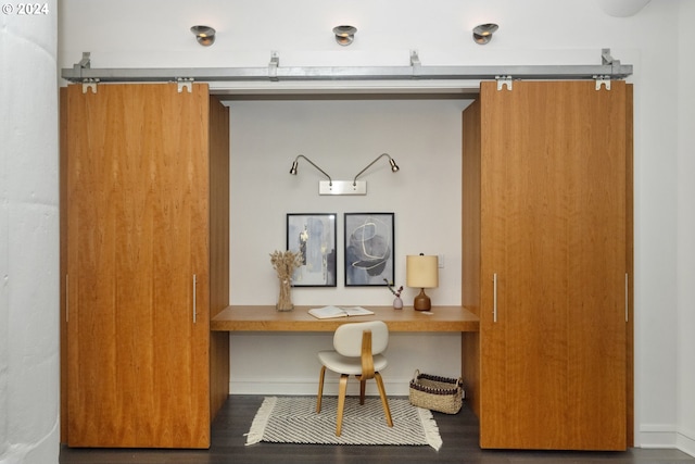 office space with dark wood-type flooring