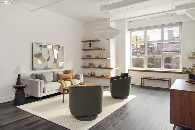 living room with dark hardwood / wood-style floors