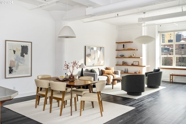 dining space featuring dark wood-type flooring