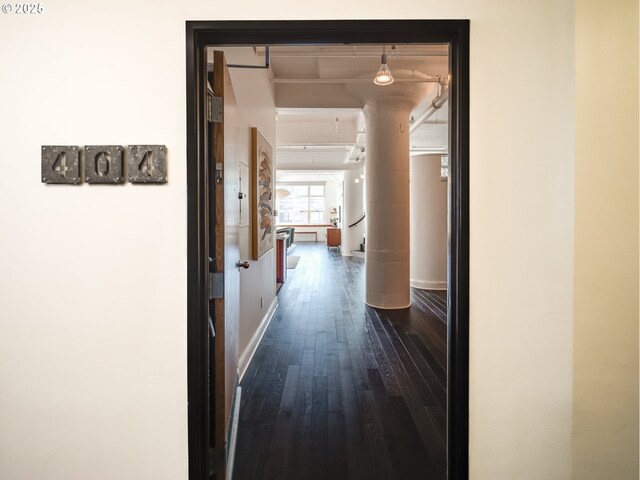 dining space with dark hardwood / wood-style floors