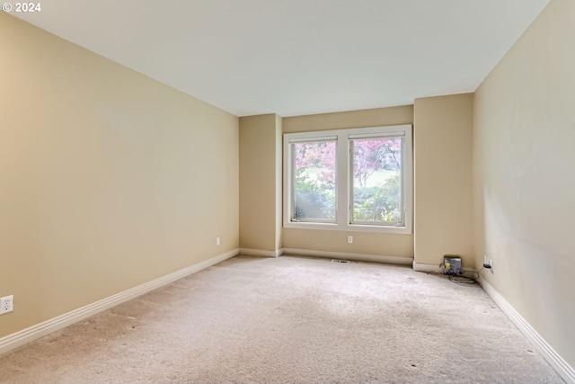 empty room featuring carpet floors