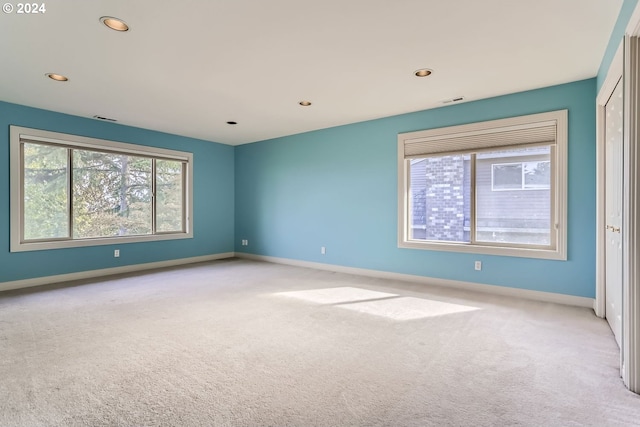 view of carpeted spare room