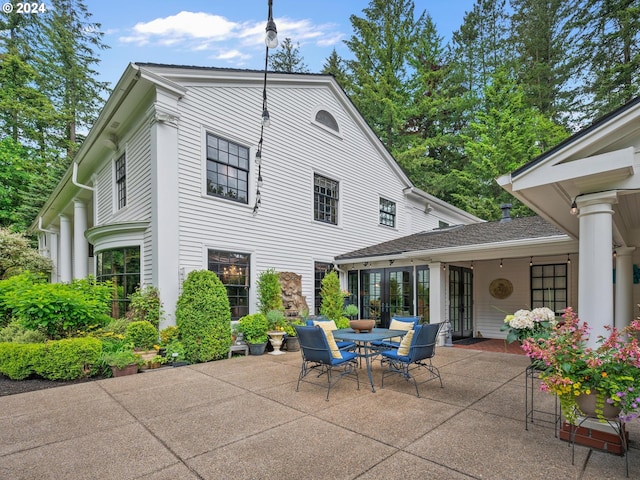 back of house with a patio area