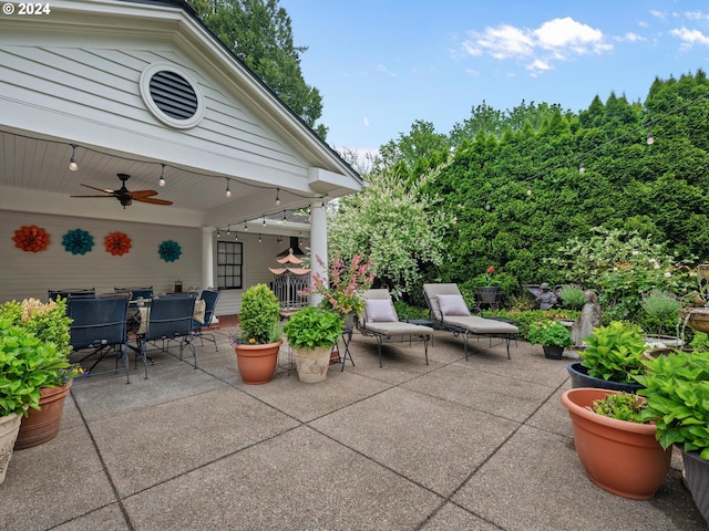 view of patio with ceiling fan