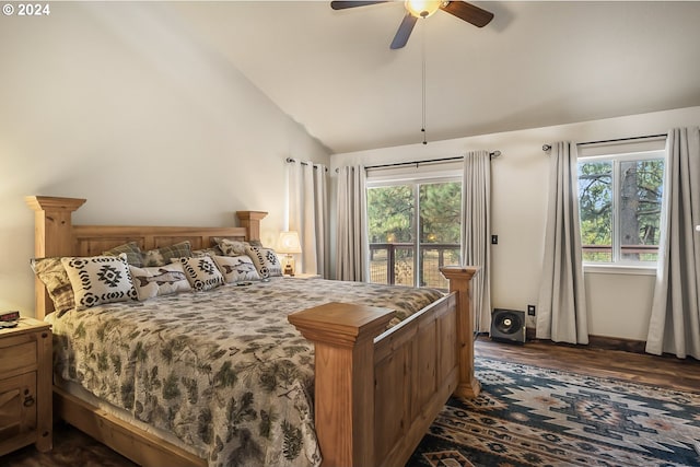 bedroom featuring ceiling fan, dark hardwood / wood-style flooring, and lofted ceiling