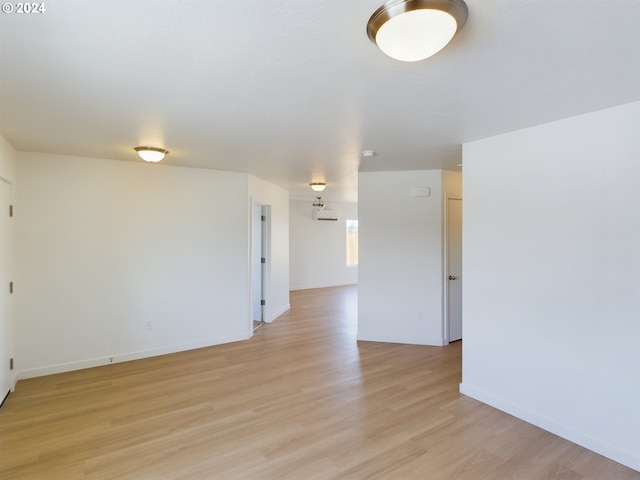 empty room with light wood-type flooring