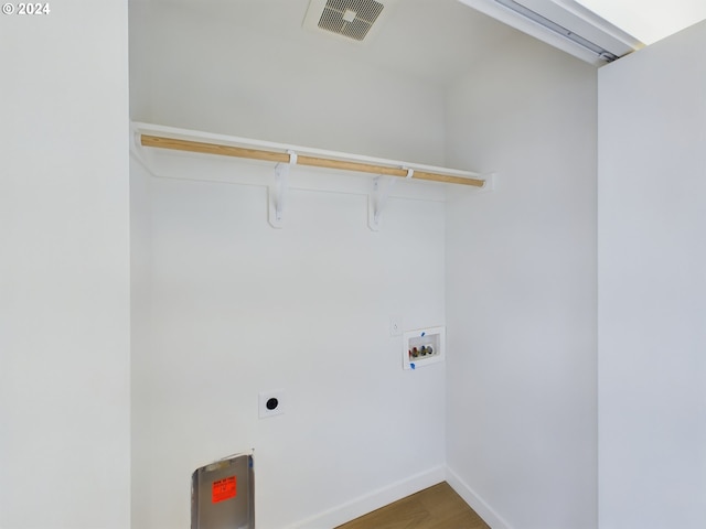 laundry area featuring hookup for a washing machine and wood-type flooring