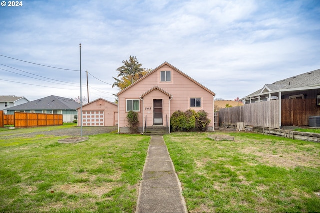 bungalow featuring central air condition unit and a front lawn