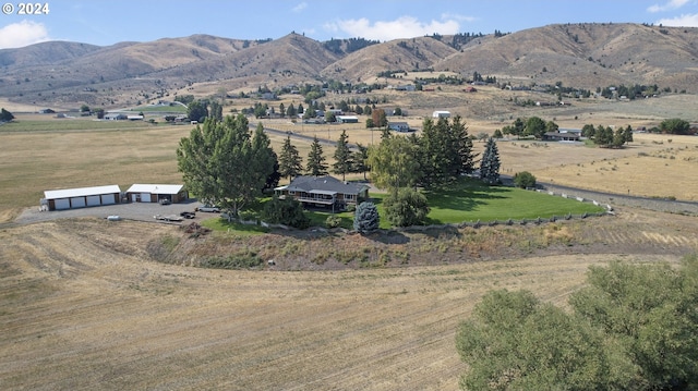 view of mountain feature with a rural view