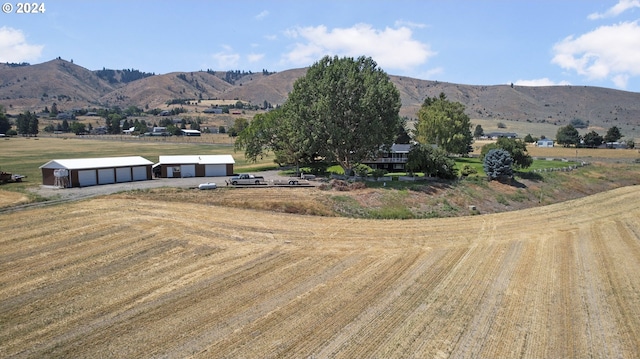 property view of mountains with a rural view