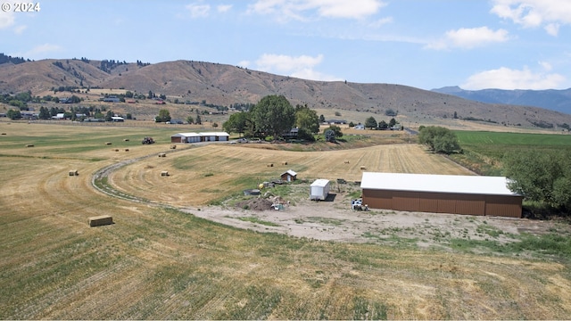 view of mountain feature with a rural view