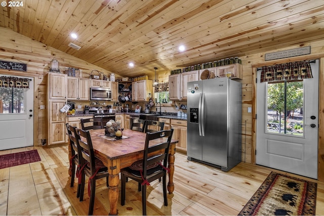 dining room with wooden ceiling, lofted ceiling, wooden walls, and light hardwood / wood-style flooring