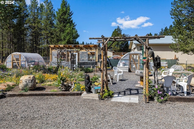 view of jungle gym featuring an outdoor structure