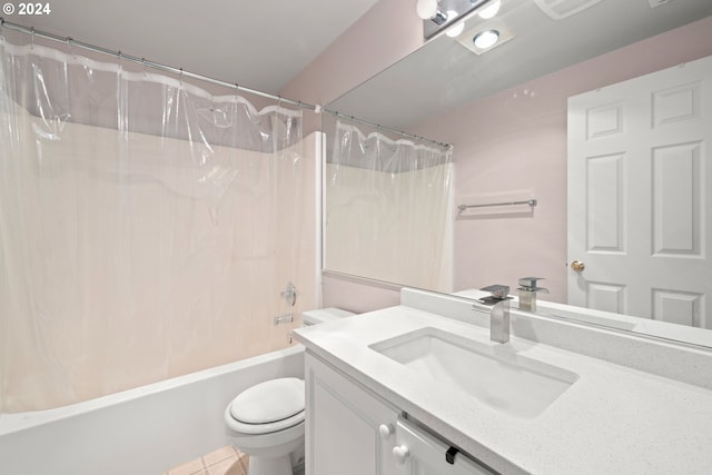 full bathroom with vanity, toilet, tile patterned floors, and shower / bath combo with shower curtain